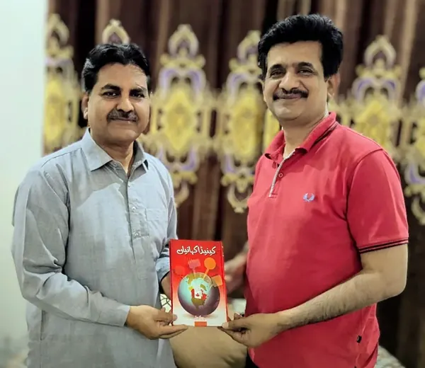 With Zaheer Babar
