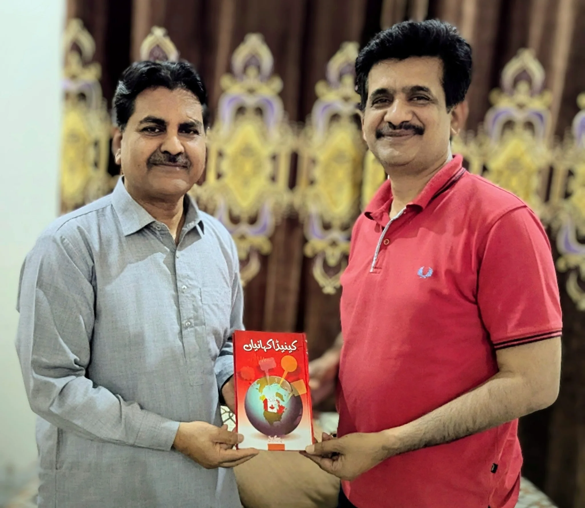 With Zaheer Babar